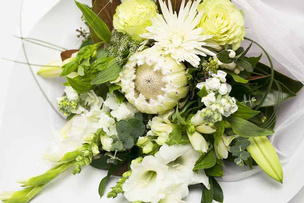Long-Stemmed-White-Wrap-White-Flower-Bouquet.jpg